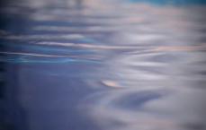 Macro shot of rippling blue water