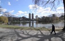 People walking by in Central Park NYC
