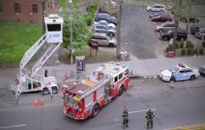Firefighters backing up fire truck